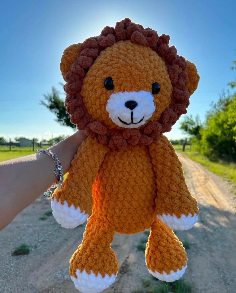 a large crochet lion plush